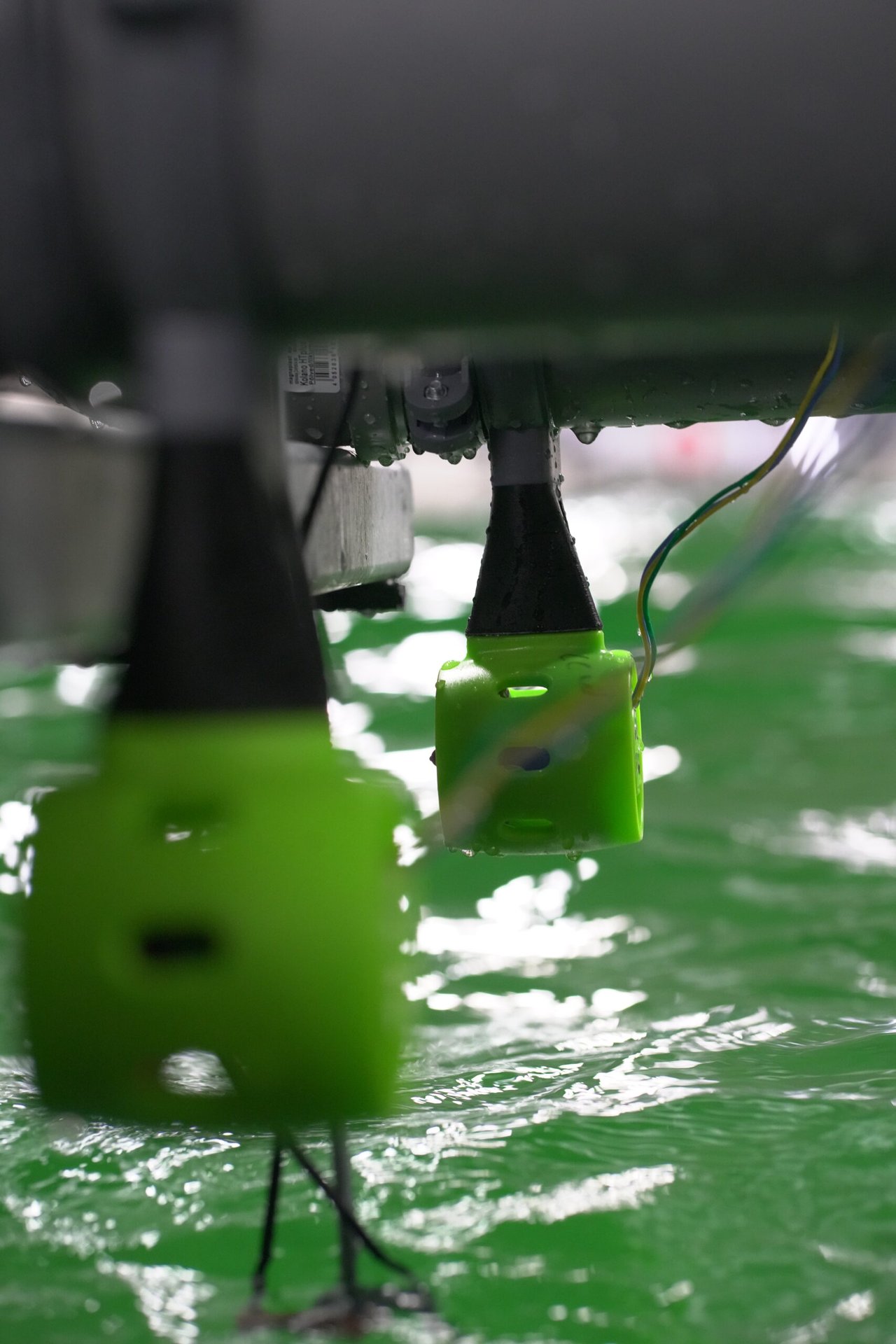 Students with radio-controlled boat